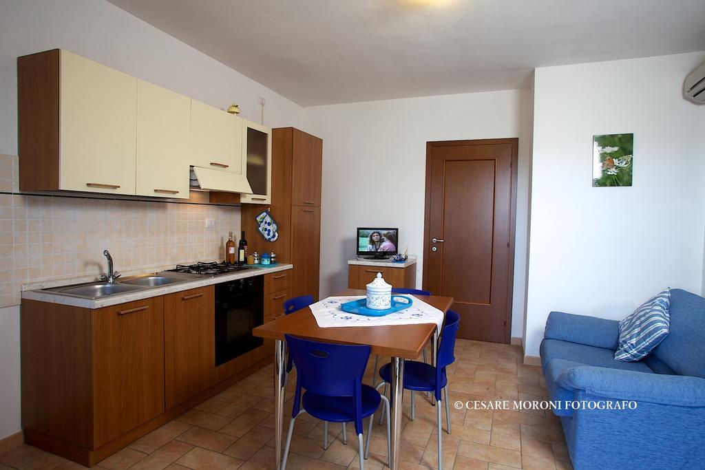 Residence Ai Campi Da Golf Saturnia Szoba fotó